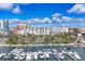 Stunning marina view with boats docked against a backdrop of city buildings on a bright, sunny day at 101 S Gulfstream Ave # 14G, Sarasota, FL 34236