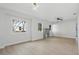 Bright living room with natural light, a ceiling fan, and modern flooring at 1045 22Nd N Ave, St Petersburg, FL 33704