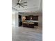 Modern kitchen boasts dark wood cabinets, a center island, and stainless steel appliances at 1056 Tampa Rd, Venice, FL 34293