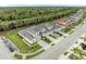 Overhead angle featuring the property and its surroundings, highlighting the neighborhood layout and green spaces at 11607 Meadowgate Pl, Bradenton, FL 34211