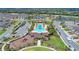 Community aerial showcasing the pool, playground, clubhouse, and Gathering friendly neighborhood at 11607 Meadowgate Pl, Bradenton, FL 34211