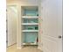 Hallway featuring nautical-themed decorations, tiled flooring and recessed lighting at 11607 Meadowgate Pl, Bradenton, FL 34211