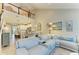 Spacious living room flows to the kitchen and dining area, creating an open layout at 11607 Meadowgate Pl, Bradenton, FL 34211