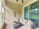 Relaxing screened patio with comfortable seating, ideal for outdoor enjoyment at 11607 Meadowgate Pl, Bradenton, FL 34211
