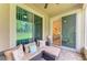 Inviting screened patio features comfortable seating, great outdoor entertaining space at 11607 Meadowgate Pl, Bradenton, FL 34211