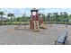 Outdoor community playground featuring swings, slides, and climbing structure at 11607 Meadowgate Pl, Bradenton, FL 34211