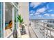 Enjoy this private balcony with comfortable seating and city views, perfect for relaxing at 1350 Main St # 1701, Sarasota, FL 34236
