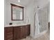 Modern bathroom with a glass-enclosed shower, vanity, and elegant fixtures at 1350 Main St # 1701, Sarasota, FL 34236