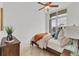 Cozy bedroom featuring a window with city views, modern decor, and comfortable furnishings at 1350 Main St # 1701, Sarasota, FL 34236