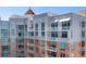 Multi-story condo building features multiple balconies and large windows allowing abundant natural light at 1350 Main St # 1701, Sarasota, FL 34236