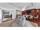 Luxurious game room with multiple seating areas, a pool table and a wet bar with counter seating at 1350 Main St # 1701, Sarasota, FL 34236