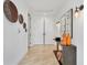 Hallway with decorative wall accents, tiled floors, and stylish light fixtures at 1350 Main St # 1701, Sarasota, FL 34236
