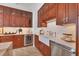 Beautiful kitchen with custom cabinets, stone countertops, and stainless steel appliances at 1350 Main St # 1701, Sarasota, FL 34236