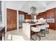 Beautiful kitchen with stainless steel appliances, granite countertops and a large central island at 1350 Main St # 1701, Sarasota, FL 34236