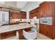 Modern kitchen with stainless steel appliances, granite countertops, and white subway tile backsplash at 1350 Main St # 1701, Sarasota, FL 34236