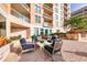 Inviting outdoor patio featuring comfortable seating arrangements and decorative plants at 1350 Main St # 1701, Sarasota, FL 34236
