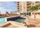 Lovely outdoor pool and lounge area with city views at 1350 Main St # 1701, Sarasota, FL 34236