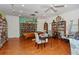 Cozy common room with bookshelves, tables, and chairs at 1350 N Portofino Dr # 108, Sarasota, FL 34242