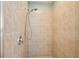 Tiled shower with handheld showerhead at 1655 Pinyon Pine Dr, Sarasota, FL 34240