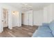 Cozy bedroom with ensuite bath, closet, ceiling fan, and comfortable seating at 1730 Hudson St, Englewood, FL 34223