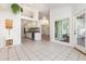 Bright kitchen featuring white cabinetry, modern appliances, and open layout at 1730 Hudson St, Englewood, FL 34223