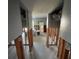 Interior view of a property undergoing renovations with exposed wall studs and stored items at 1801 Gulf N Dr # 184, Bradenton Beach, FL 34217