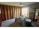A bright room needing renovation, featuring a large window and exposed walls at 1801 Gulf N Dr # 184, Bradenton Beach, FL 34217