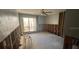 Living room featuring a large window and exposed framing awaiting transformation at 1801 Gulf N Dr # 184, Bradenton Beach, FL 34217