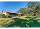 Expansive backyard with lush greenery, perfect for outdoor activities and relaxation at 1809 Curry Trl # 20, Nokomis, FL 34275