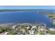 Aerial view of waterfront home with piers and vast water views at 2212 6Th W St, Palmetto, FL 34221