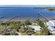 Stunning aerial view of waterfront property with docks and open water at 2212 6Th W St, Palmetto, FL 34221