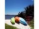 Kayaks and crab trap on sandy beach with picturesque water views at 2212 6Th W St, Palmetto, FL 34221