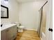 Well-lit bathroom featuring a modern vanity, toilet, and shower with tile surround and ample space at 2543 River Preserve Ct # 2543, Bradenton, FL 34208