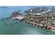 Scenic aerial view of waterfront community near the Gulf of Mexico and Tampa Bay at 285 Madeira Cir, Tierra Verde, FL 33715