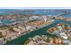 Waterfront condo community aerial view featuring boat docks and lush landscaping, close to the Gulf of Mexico at 285 Madeira Cir, Tierra Verde, FL 33715