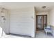 The garage and entryway feature a bright, clean space, and the front door has glass panels for natural light at 285 Madeira Cir, Tierra Verde, FL 33715