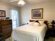 Bedroom featuring a ceiling fan, classic furnishings, and decor at 3002 Vivienda Dr # 22, Bradenton, FL 34207