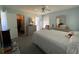 Charming bedroom with soft blue walls, a large dresser, and access to a walk-in closet at 3002 Vivienda Dr # 22, Bradenton, FL 34207