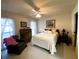 Bright bedroom with a ceiling fan, classic furnishings, and soft, inviting textures at 3002 Vivienda Dr # 22, Bradenton, FL 34207