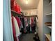Walk-in closet with shelving, hanging rods, and storage solutions at 3002 Vivienda Dr # 22, Bradenton, FL 34207