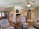 Comfortable living area with a glimpse of the kitchen, complete with ample seating and natural light at 3002 Vivienda Dr # 22, Bradenton, FL 34207