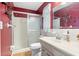 The bathroom features a step-in shower, vanity, and updated fixtures at 3016 Taunton W Dr, Bradenton, FL 34205