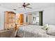Cozy bedroom featuring access to the lanai and dining room and includes a large wardrobe at 3016 Taunton W Dr, Bradenton, FL 34205