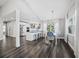 Bright open kitchen with an island, stainless steel appliances and adjacent dining area at 3376 S Seclusion Dr, Sarasota, FL 34239