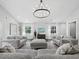 Bright living room boasts recessed lighting, vaulted ceilings and updated furniture at 3376 S Seclusion Dr, Sarasota, FL 34239