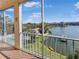 Enjoy stunning views of the lake and community pool from this screened balcony at 3424 Lake Bayshore Dr # 405, Bradenton, FL 34205