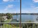 Enjoy this relaxing lake view from the comfort of the screened in balcony at 3424 Lake Bayshore Dr # 405, Bradenton, FL 34205