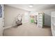 Bright bedroom features carpeted floors, bunk beds with integrated desk, and modern cube storage at 3442 Chestertown Loop, Bradenton, FL 34211