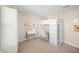 Bedroom features bunk bed, carpeted floors, vanity, and cube storage unit at 3442 Chestertown Loop, Bradenton, FL 34211