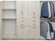 Well-organized closet with hanging rods, shelves, and drawers for maximum storage efficiency at 3442 Chestertown Loop, Bradenton, FL 34211